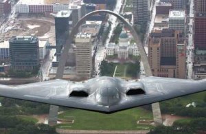 The Stealth Bomber - based in Missouri - flies over the Gateway Arch.