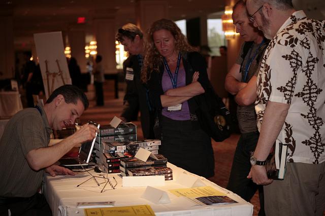 Author Brian Enke signs copies of his book Shadows of Medusa at the International Space Development Conference
