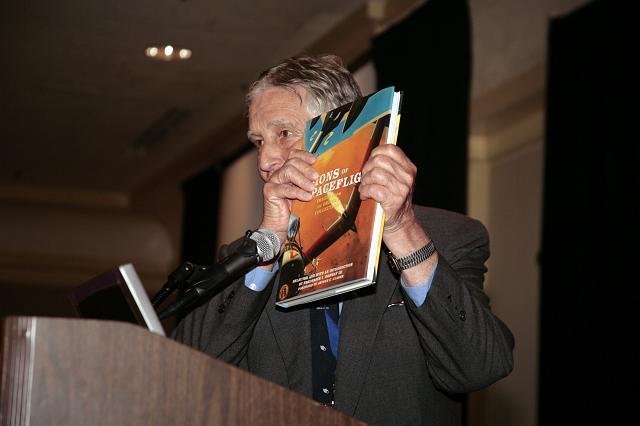 NSS Governor Frederick I. Ordway III  displaying a copy of his outstanding book Visions of Spaceflight: Images from the Ordway Collection at the International Space Development Conference