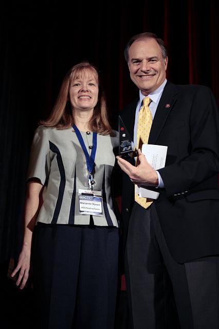 Author and NSS Director Marianne Dyson presents Rep. Nick Lampson with an NSS Pyramid as thanks for participating in the International Space Development Conference hosted by the National Space Society, on May 25, 2007, in Dallas, TX. 